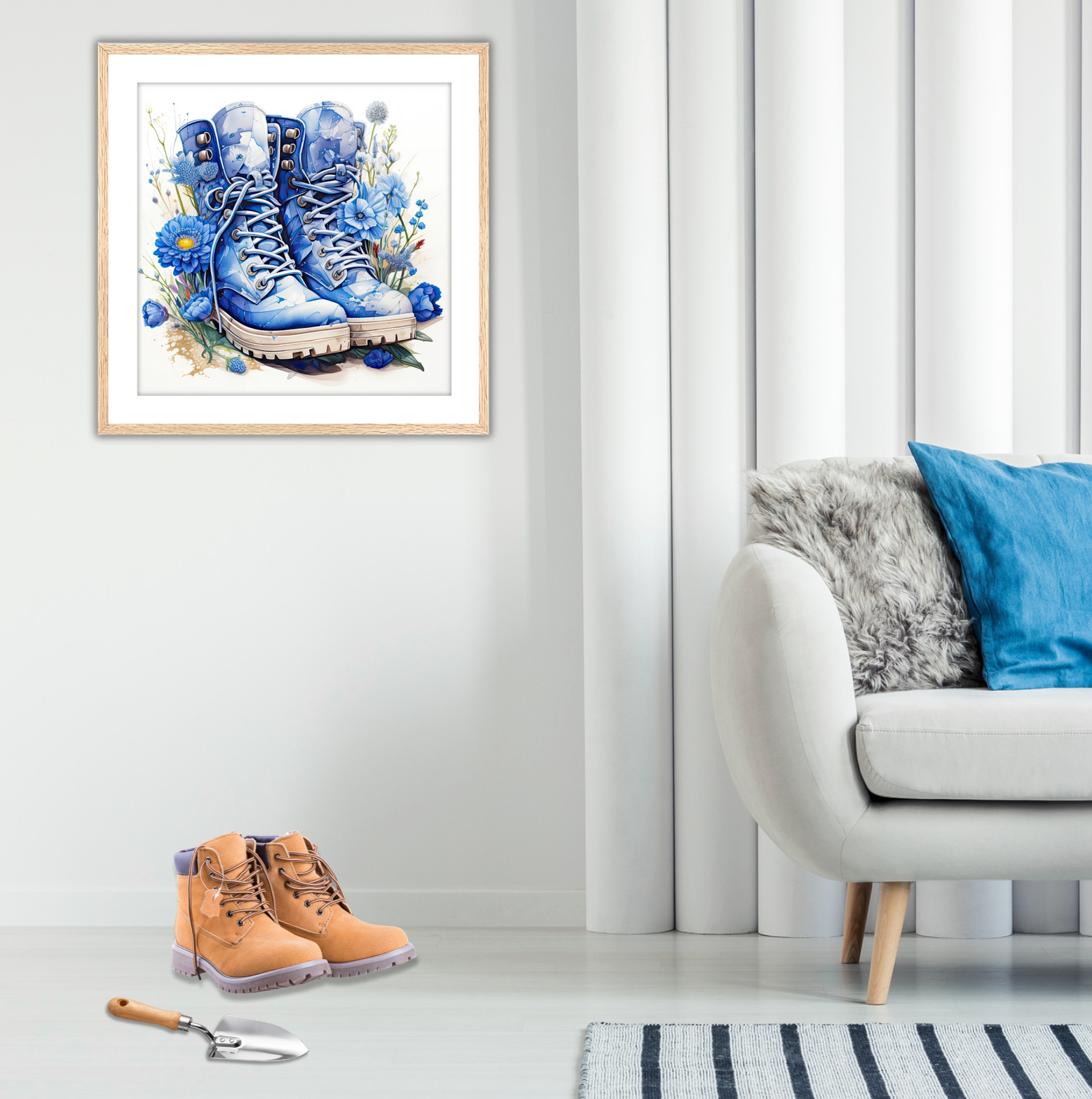 Adorable Framed Fine Art Print on display in a modern living room. The artwork features watercolor style blue hiking boots surrounded in blue wildflowers. A great gift for women hiking or gardening enthusiasts. Art comes with white mat and oak frame. This wall art is for sale at customconcepts.art