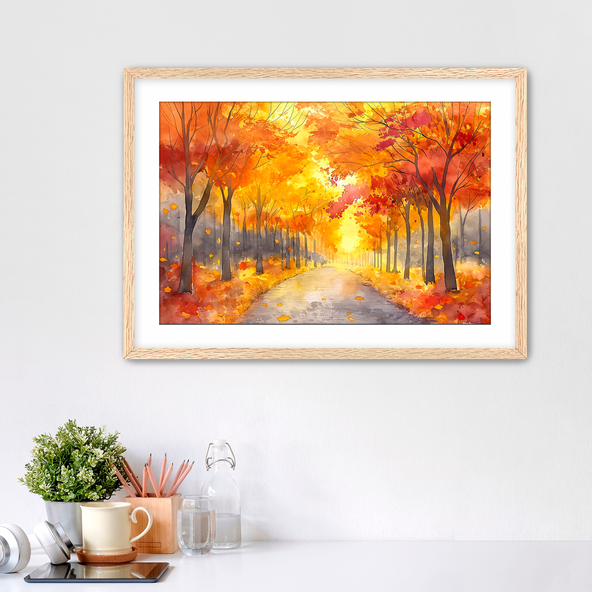 Oak framed watercolor autumn trees and a path with white mat. Perfect for fall decor. Art for sale at customconcepts.art
